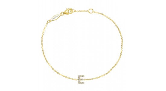 A yellow gold chain bracelet with a diamond studded “E” charm, available at Windsor Jewelers.